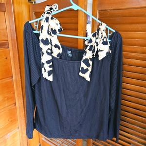 Black long sleeve blouse with Leopard print bows.